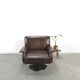 Brown leather swivel chair