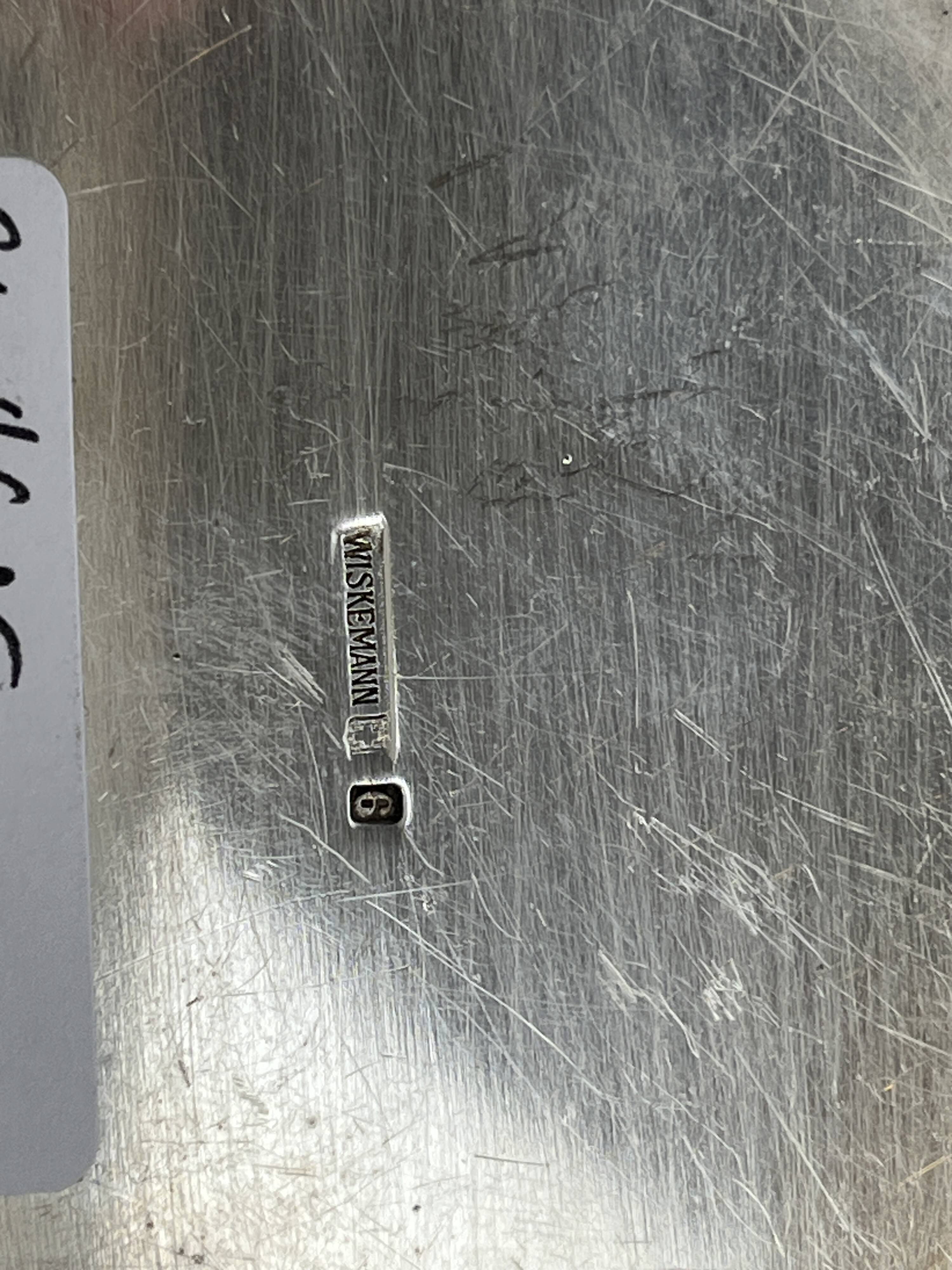 Oval metal silver-plated tray with hallmarks from the early 20th century.