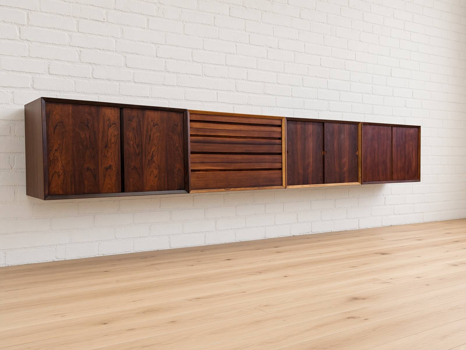 Buffet mural flottant en palissandre Poul Cadovius par CADO, années 1960.