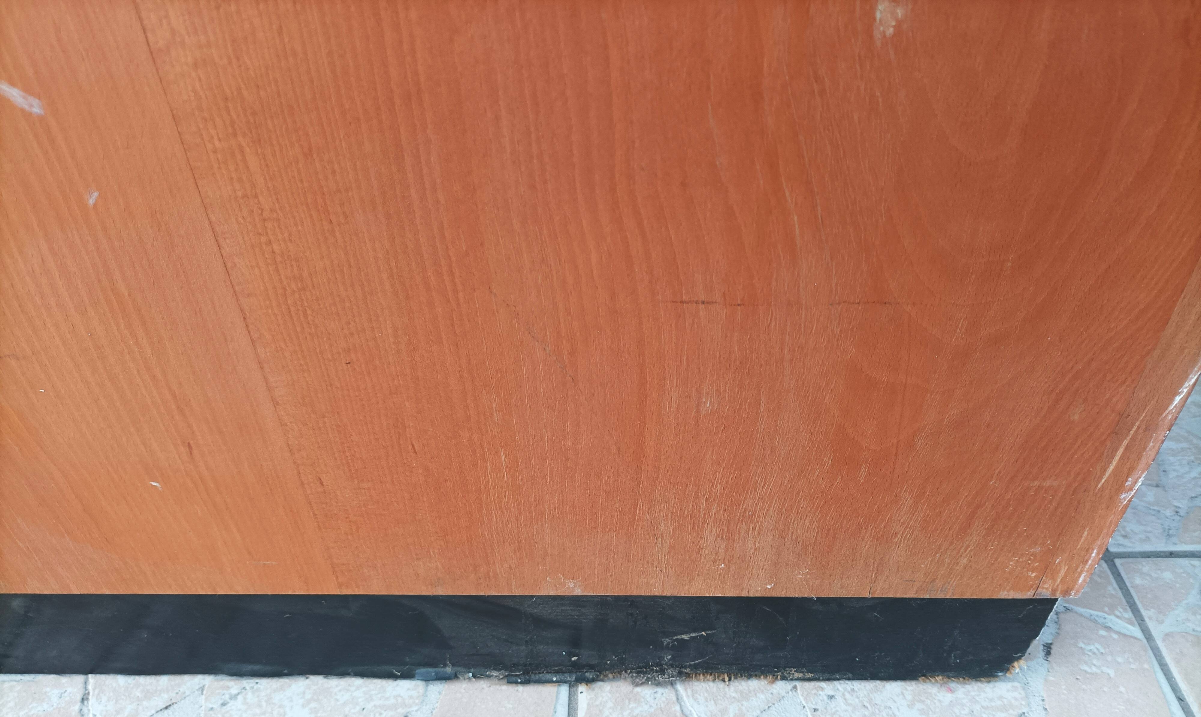 Workshop furniture with drawers and curtain in beech and walnut.