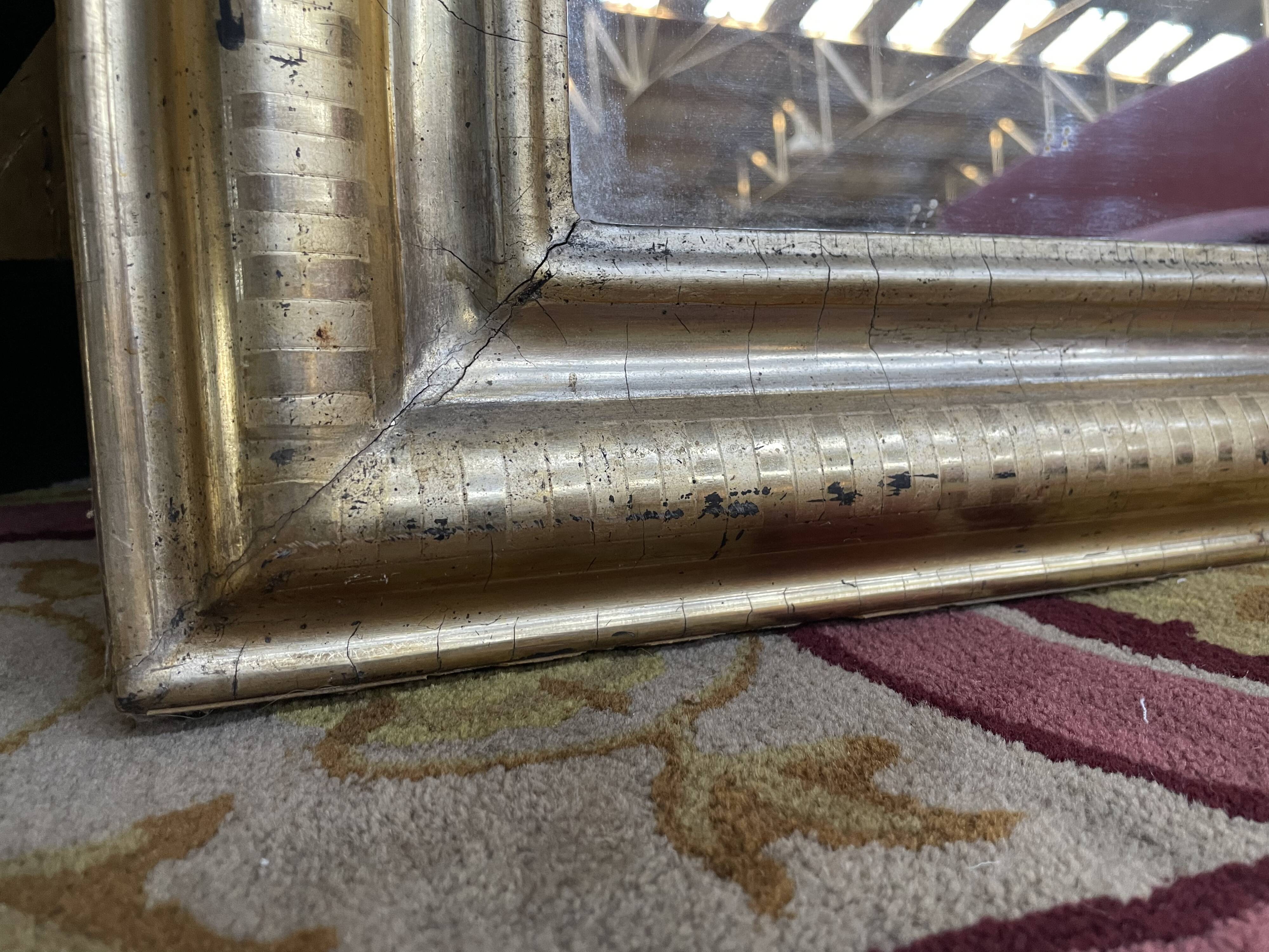 Louis Philippe period mirror with gold leaf