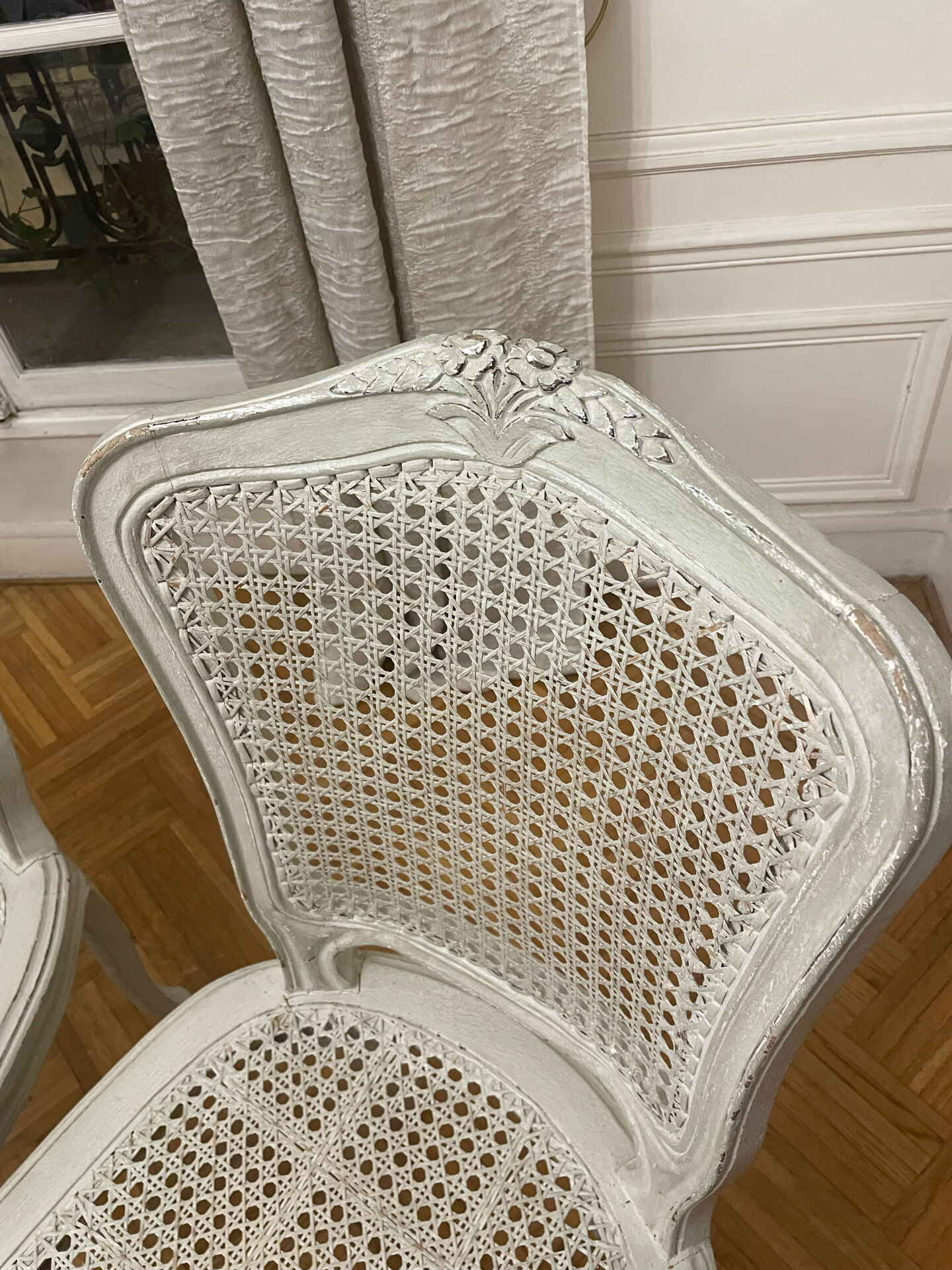 Set of 4 white caned chairs in Louis XV style.