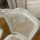 Set of 4 white caned chairs in Louis XV style.