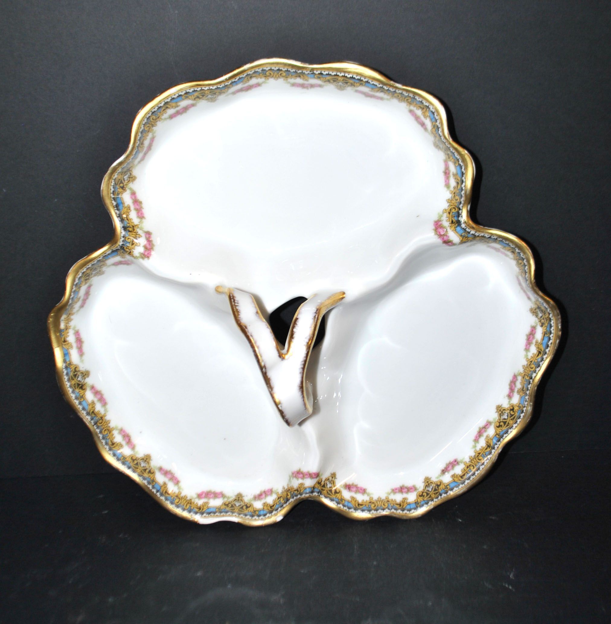 Limoges coupe mendiant polylobé en porcelaine U&C