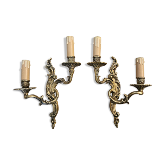 Pairs of Rocaille style bronze sconces