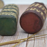 Set of 2 decorative vintage bottles covered with leather & wicker
