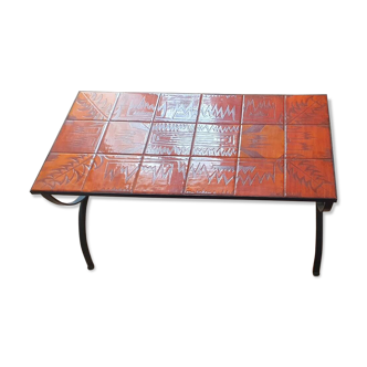 Wrought iron and orange ceramic coffee table