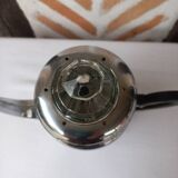 Silver metal coffee maker with glass cap