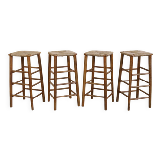 Brutalist barstools in wood and rush, 1970s, set of 4