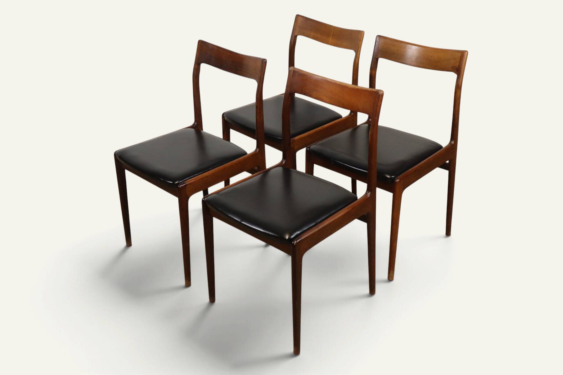 Set of 4 vintage teak and black faux leather chairs – 1960s