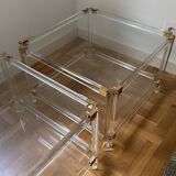 2 side tables in plexiglass, glass, and brass.