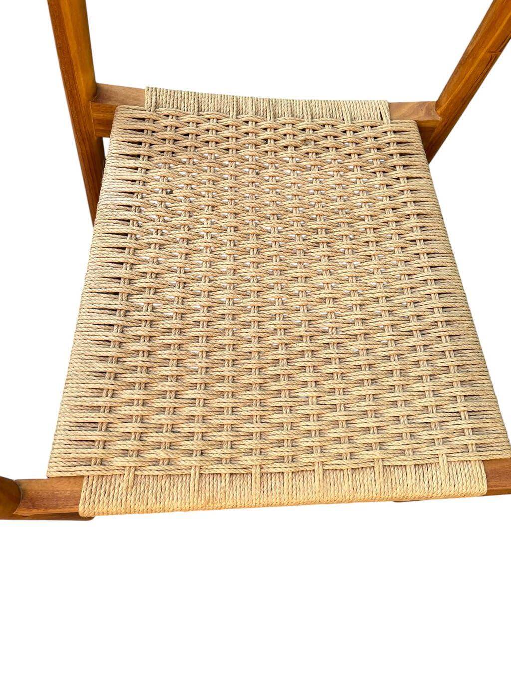 Set of 4 solid wood chairs with cord and armrests.