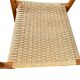 Set of 4 solid wood chairs with cord and armrests.