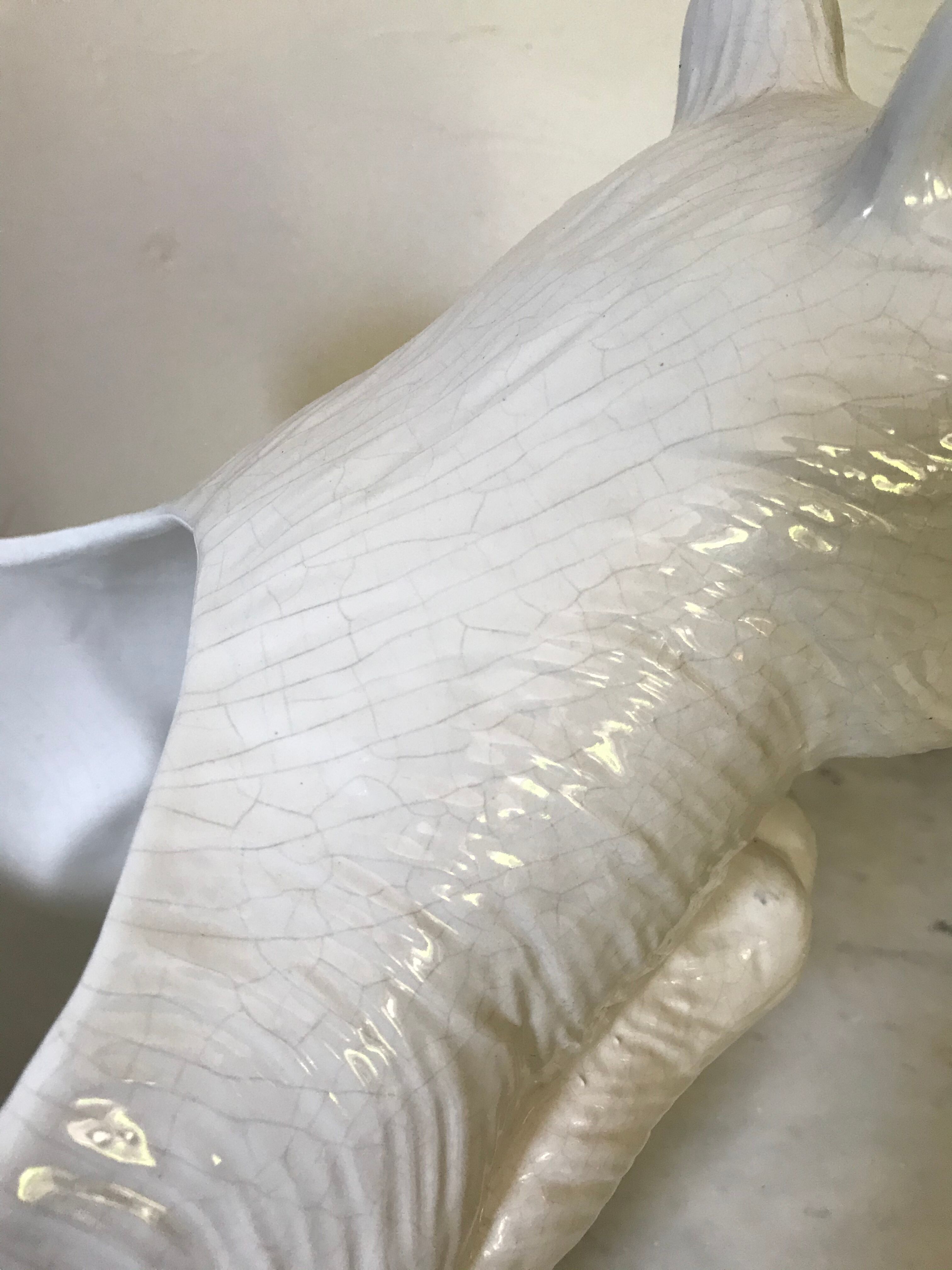 Cracked ceramic zoomorphic pot cache