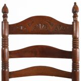 Antique wooden armchair with cane seat, France ca. 1900