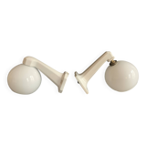 Pair of Art Deco porcelain wall lights with white Opaline globes, 1920