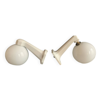Pair of Art Deco porcelain wall lights with white Opaline globes, 1920