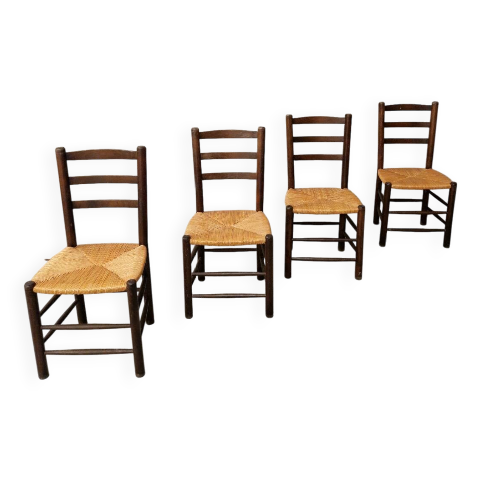 4 wooden and straw chairs