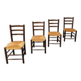 4 wooden and straw chairs