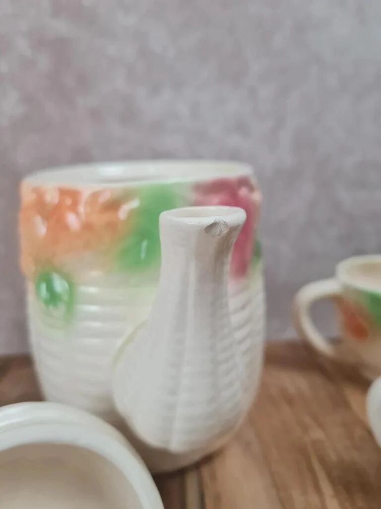 Adorable little vintage tea set in coloured earthenware.