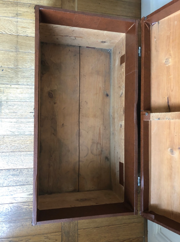 Ancient wooden and faux leather trunk