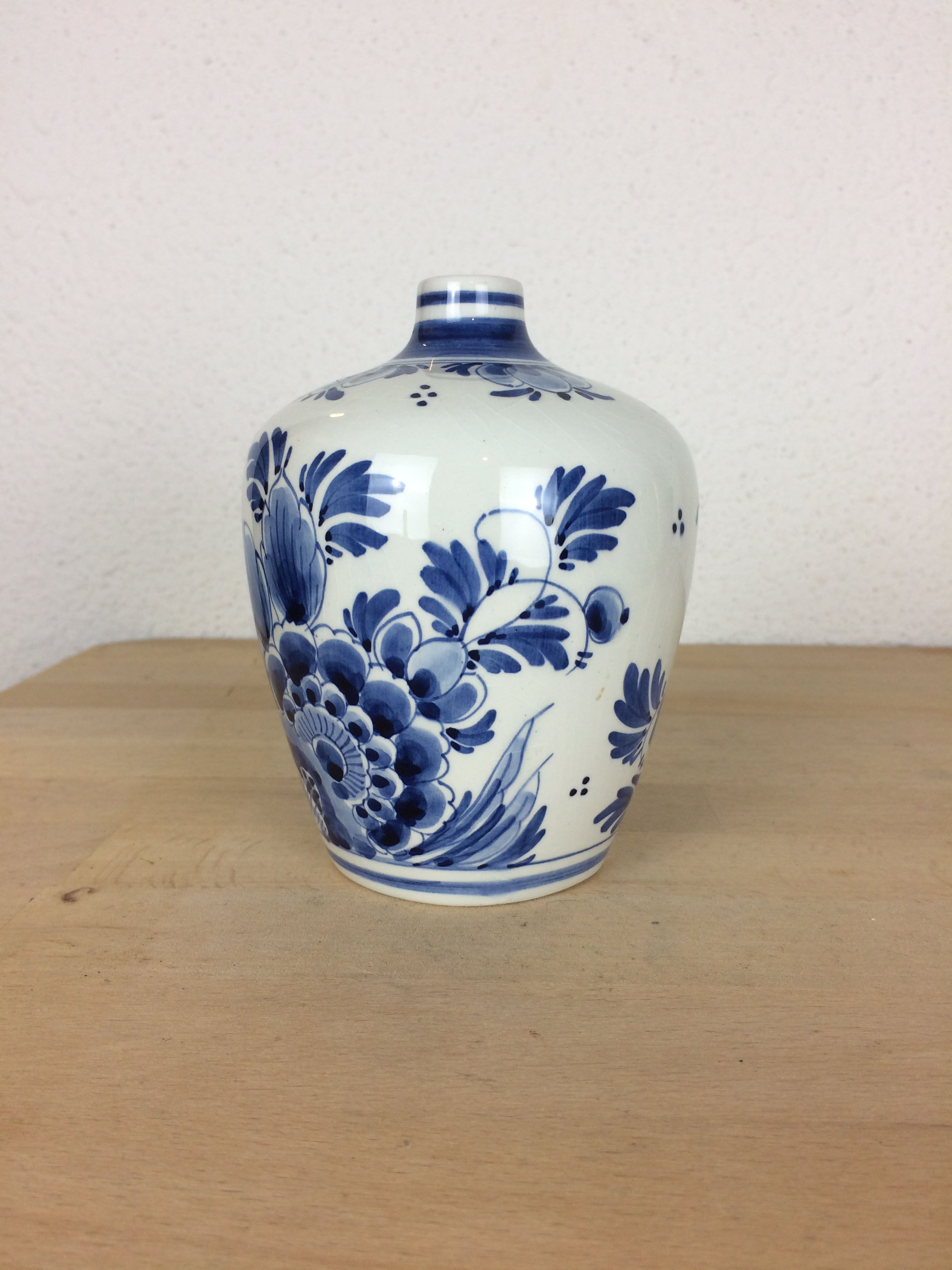 Delft earthenware vase with blue flowers