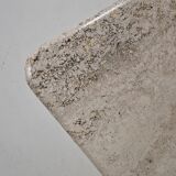 Sculptural coffee table in Italian travertine from the 1970s.