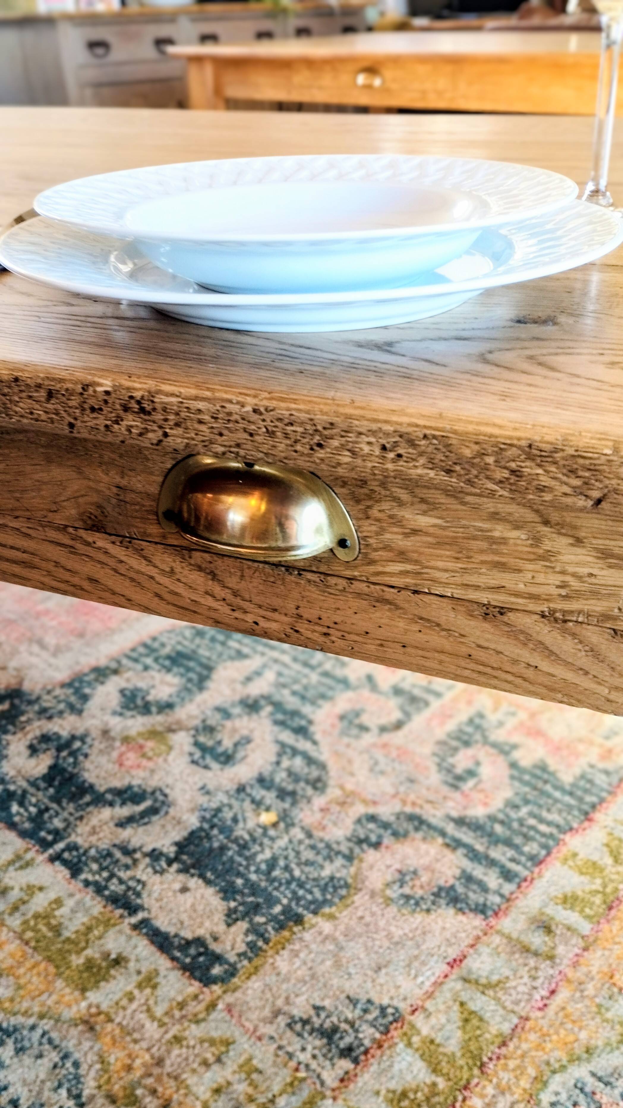 Solid oak farmhouse table with central drawer and extension