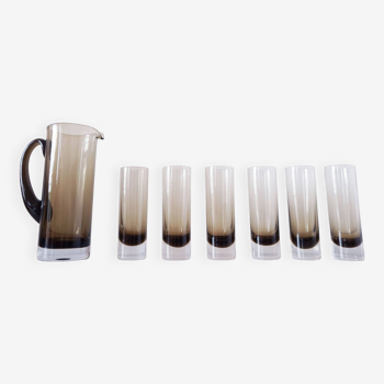 Set of 6 glasses and their gray smoked glass carafe 1970
