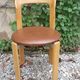 Pair of chairs by Swiss designer Bruno Rey in wood and brown skai