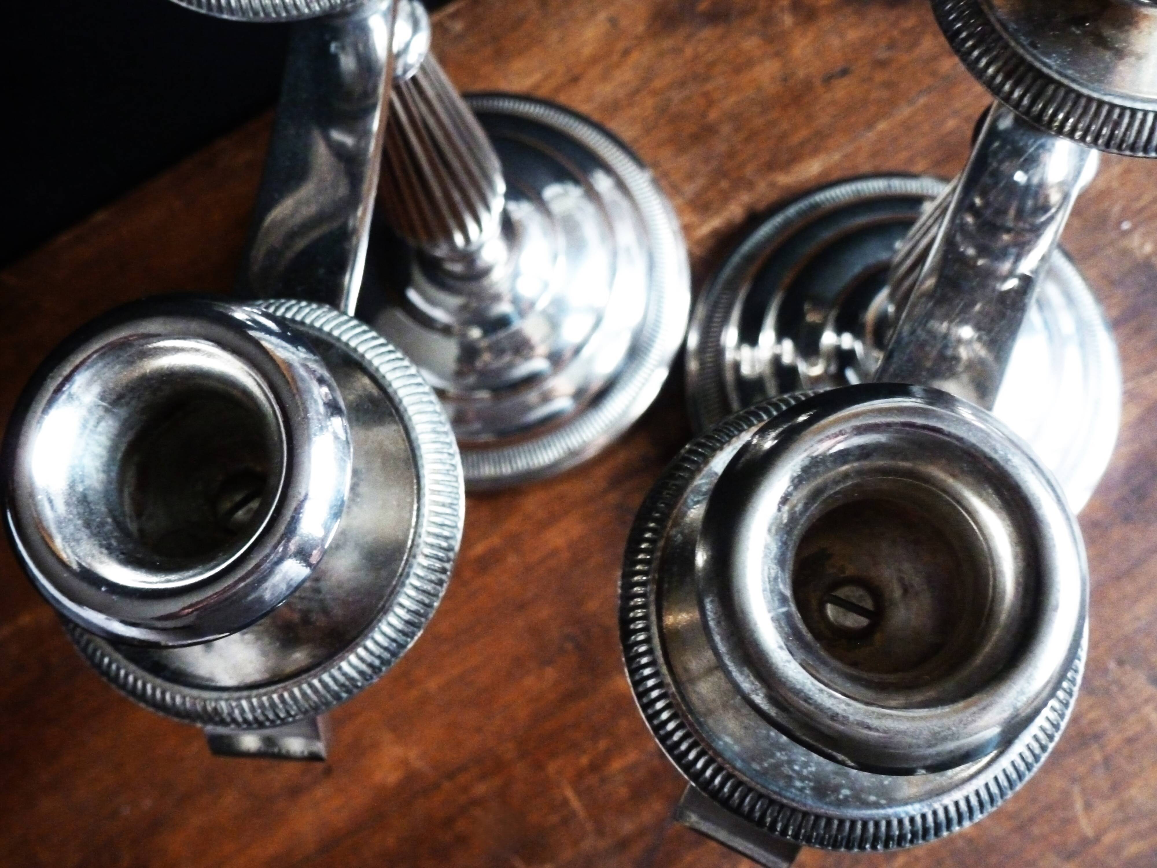 Pair of silver metal candlesticks / 3-branch silver metal candelabras.
