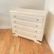 Vintage commode with moustache legs