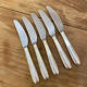 Series of 5 cheese knives or silver metal dessert