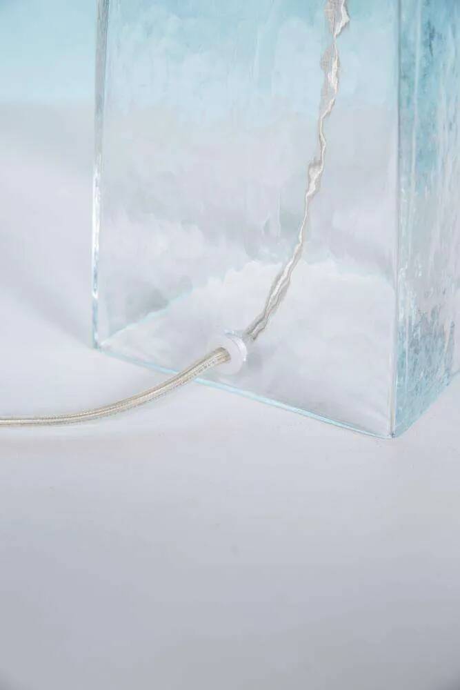 Minimalist glass table lamp from the 80s with a pleated shade.