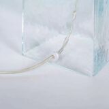 Minimalist glass table lamp from the 80s with a pleated shade.