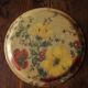 Round plastic top vintage flowers