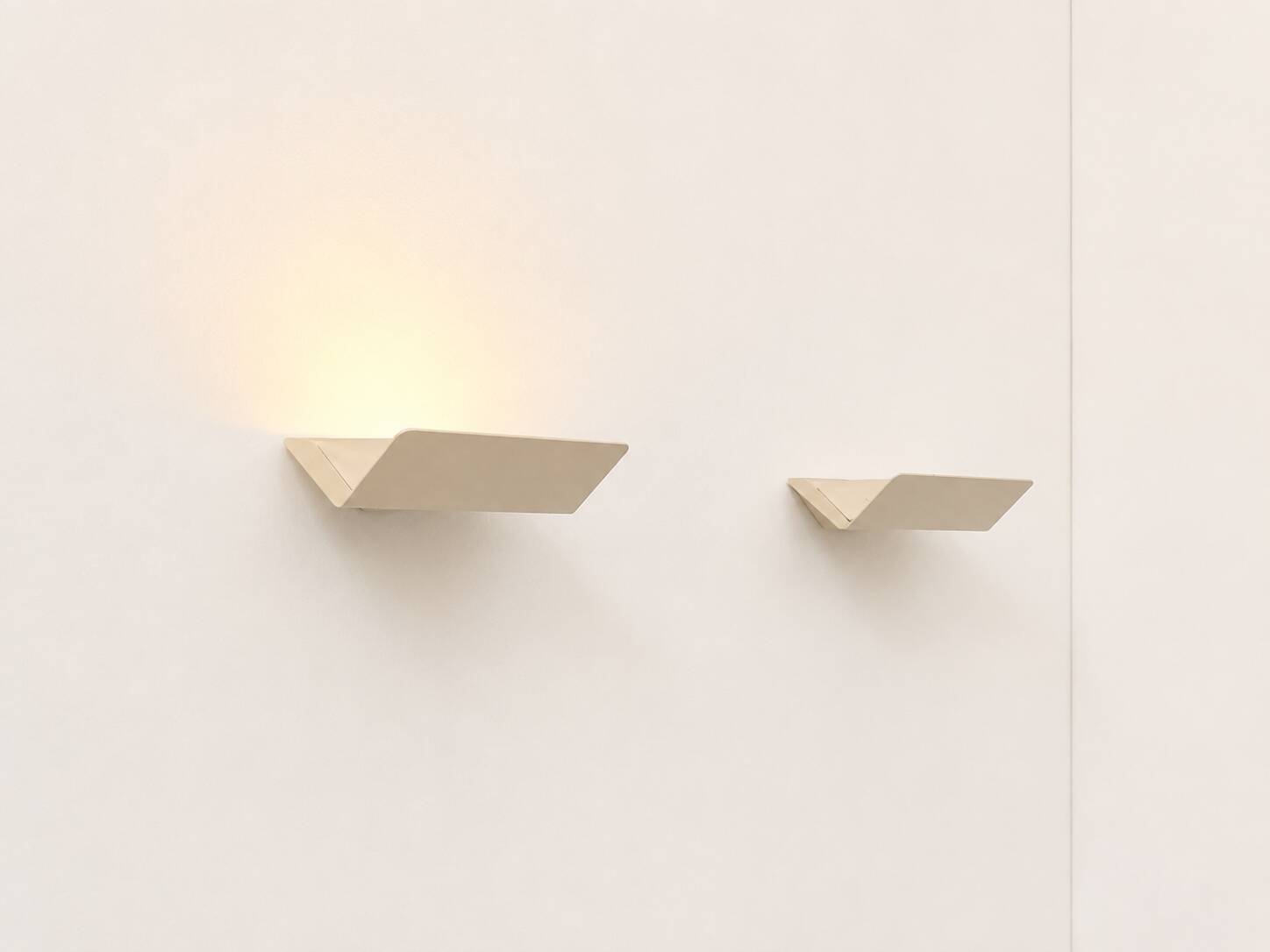 Pair of vintage wall sconces, matte white metal, France, 1970.