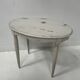 Art Deco style guéridon in patinated beech, 20th century.