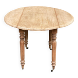 Renovated 18th century solid wood extendable round dining table with shutters