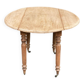 Renovated 18th century solid wood extendable round dining table with shutters