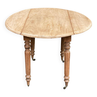 Table à manger ronde extensible à volets rénovée en bois massif du 18ème