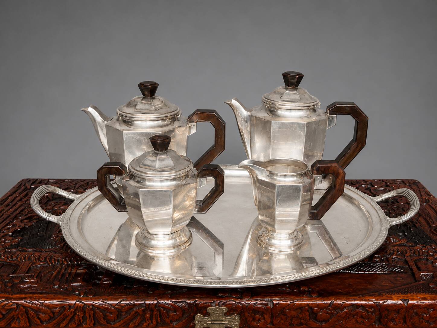 Art Deco tea and coffee service. Silver-plated metal and mahogany.