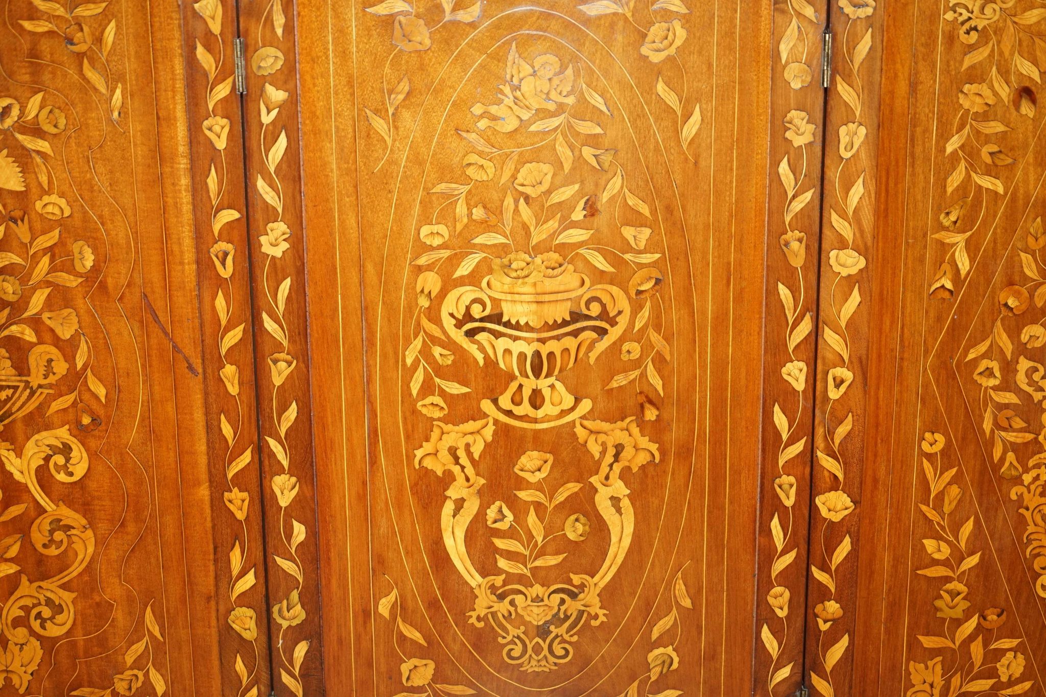 Pair of three-panel screens made of Dutch hardwood and walnut.