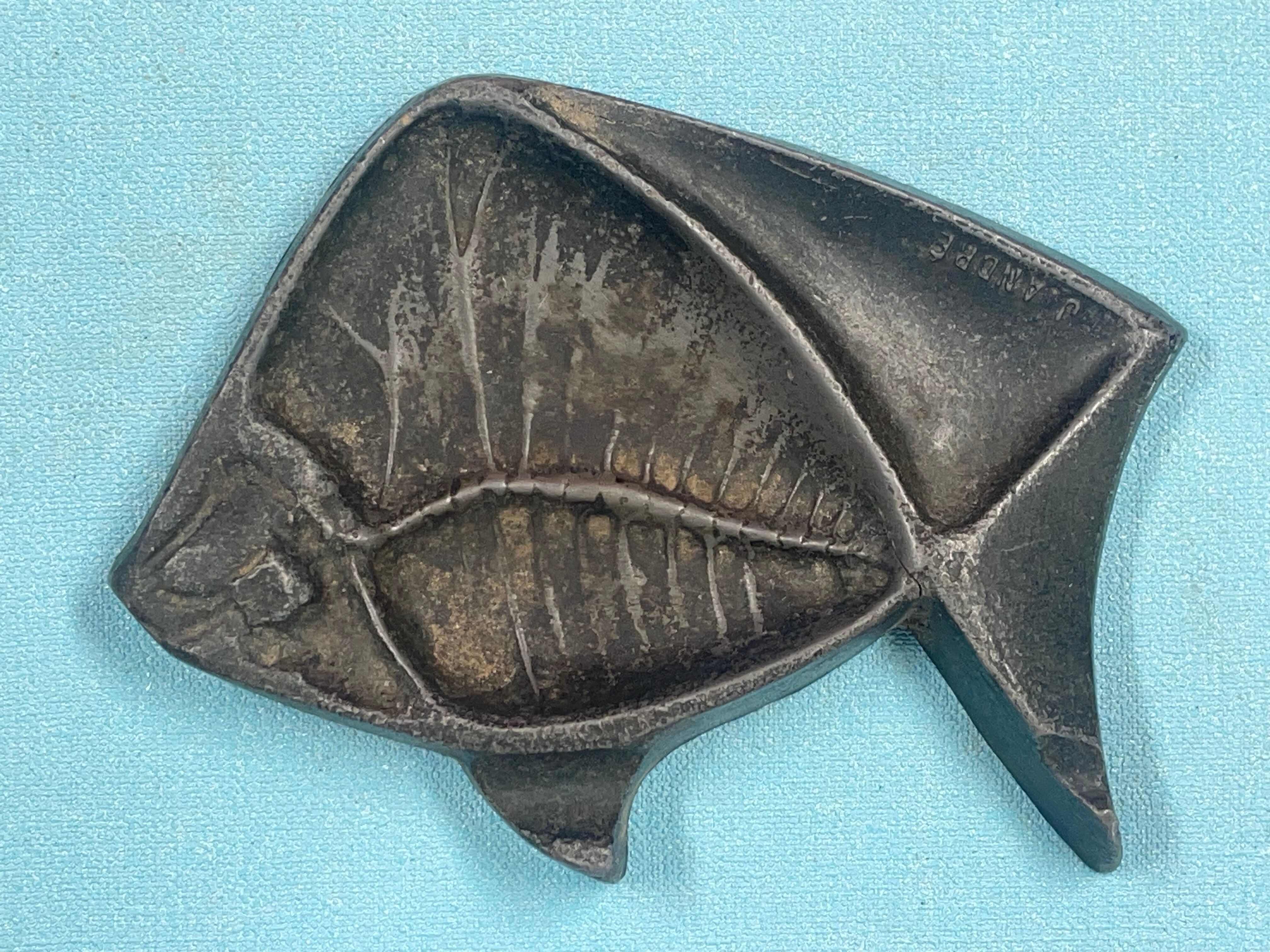 Empty pocket, art deco fish advertising ashtray signed J. André, regulates