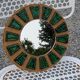 Miroir soleil en céramique des années 70