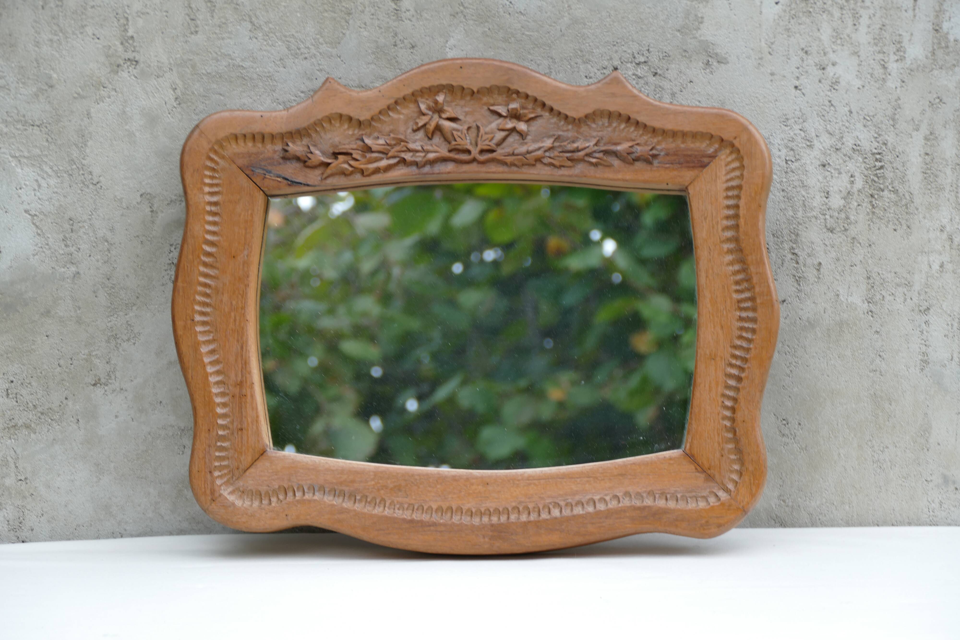 Hand-carved wooden mirror