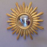 Sun mirror in golden resin from the 70s