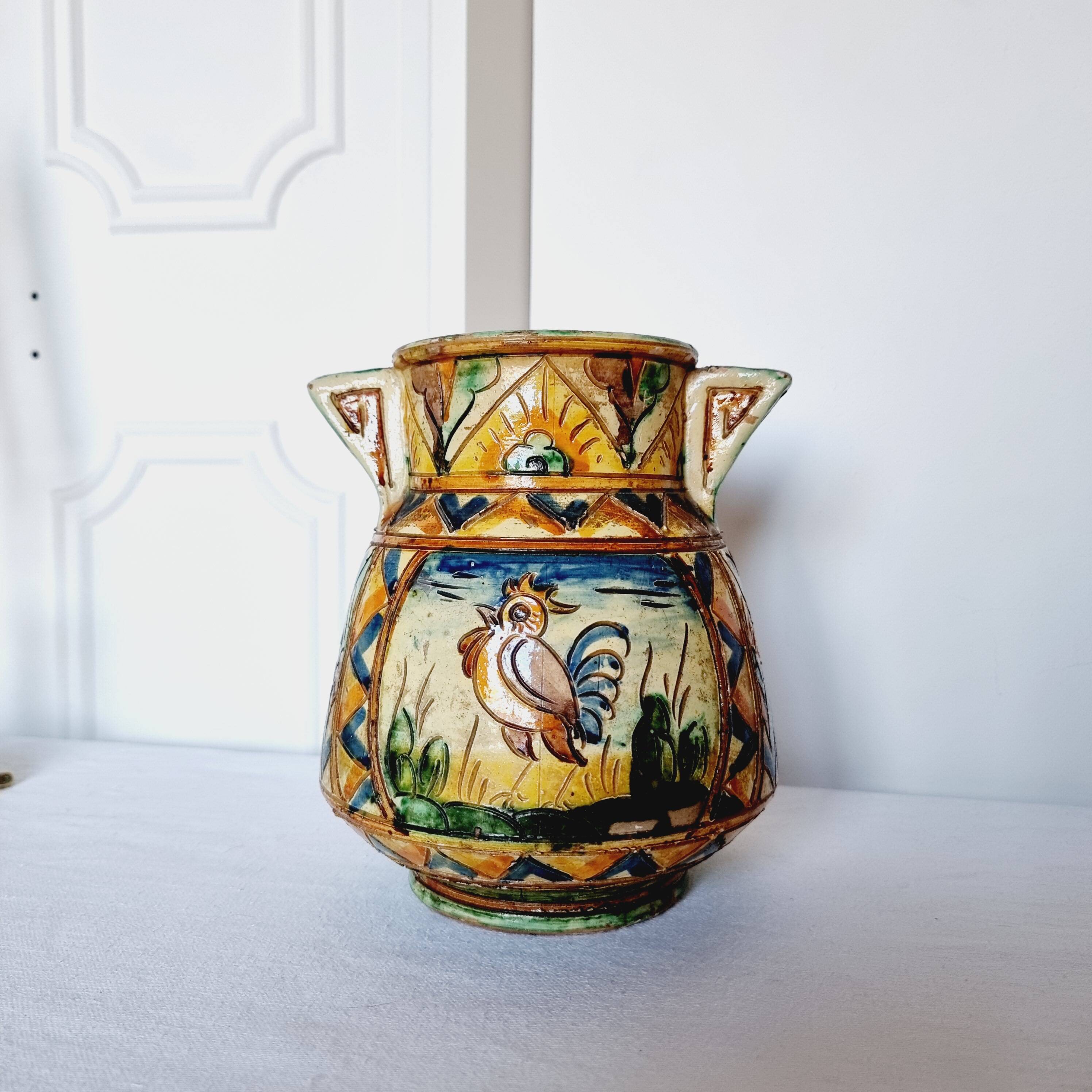 Antique majolica water pitcher made in Italy and hand painted.