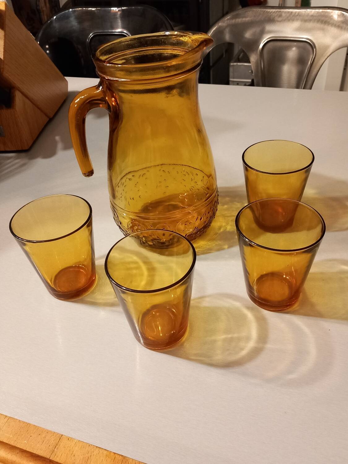 Italian pitcher service and 6 amber glasses
