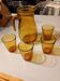 Italian pitcher service and 6 amber glasses